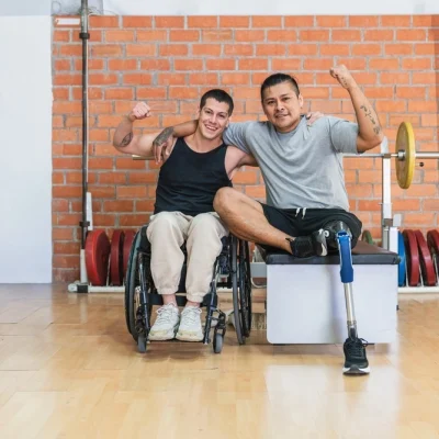 Disabled son and father in gym together